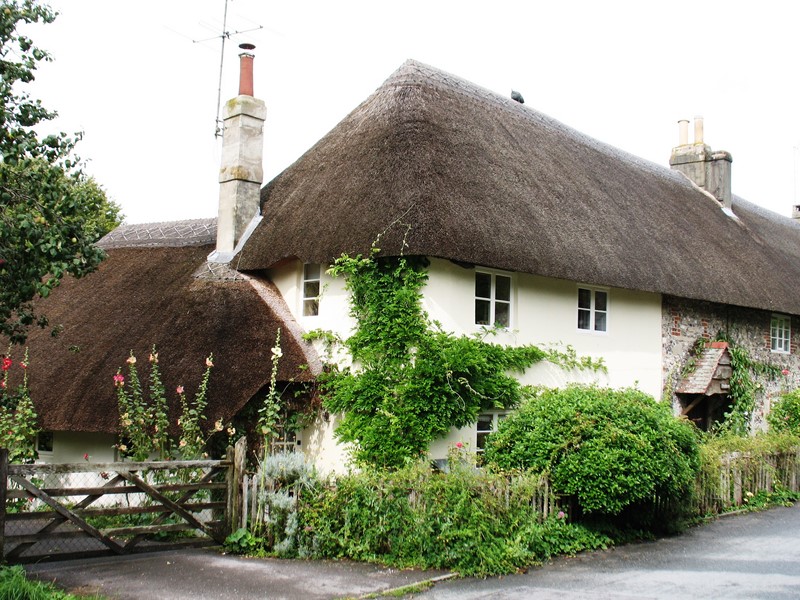 maison toit de chaume village historique sud grande bretagne